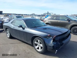 2016 Dodge Challenger SXT Plus with VIN 2C3CDZAGXGH264256, listed as a IAAI auction lot 41759183 with 128,358 mi miles. Bid and sale history available at carsss.com. Image 1.