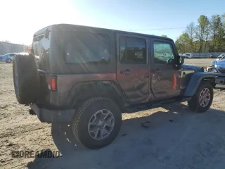 2014 Jeep Wrangler Unlimited Rubicon with VIN 1C4BJWFG4EL256824, listed as a Copart auction lot 49473815 with 117,264 mi miles and Salvage Title. Bid and sale history available at carsss.com. Image 3.