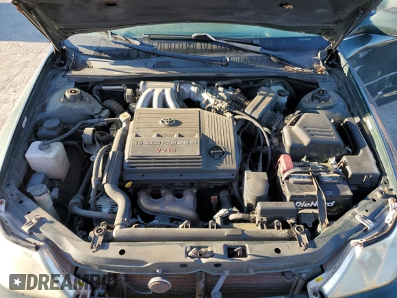 2001 Toyota Avalon XL z VIN 4T1BF28B81U162506, wystawiony jako Copart lot #52031805 z przebiegiem 212 437 mil mil oraz Szkody całkowita. Historia ofert i sprzedaży dostępna na DreamBid. Obrazek 11.