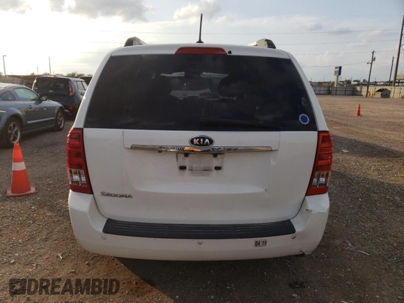 2012 Kia Sedona LX with VIN KNDMG4C79C6502438, listed as a Copart auction lot 77833384 with 169,459 mi miles and Clean Title. Bid and sale history available at carsss.com. Image 6.