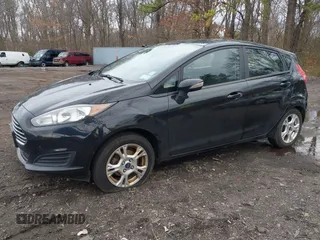 2015 Ford Fiesta SE with VIN 3FADP4EJ9FM175123, listed as a IAAI auction lot 41948452 with 130,801 mi miles. Bid and sale history available at carsss.com. Image 18.