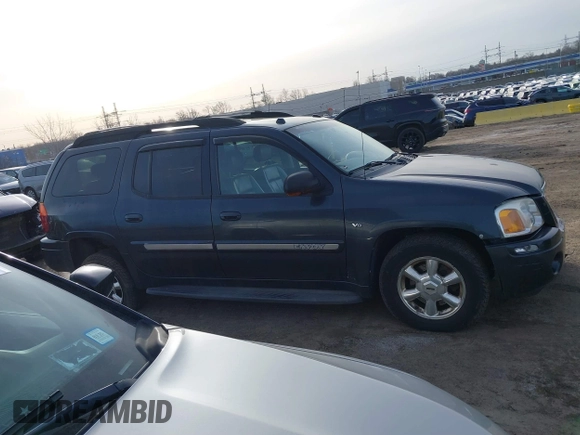 2005 GMC Envoy SLT z VIN 1GKET16M156142931, wystawiony jako IAAI lot #41584914 z przebiegiem 215 452 mil mil oraz . Historia ofert i sprzedaży dostępna na DreamBid. Obrazek 13.