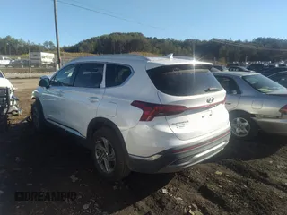 2021 Hyundai Santa Fe SEL z VIN 5NMS24AJ5MH340722, wystawiony jako IAAI lot #38331843 z przebiegiem 85 052 mil mil oraz . Historia ofert i sprzedaży dostępna na DreamBid. Obrazek 3.