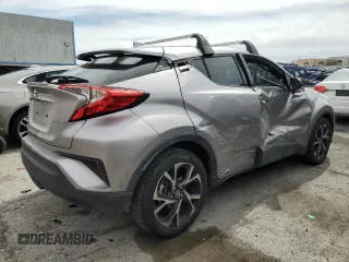 2020 Toyota C-HR LE with VIN JTNKHMBX7L1065098, listed as a Copart auction lot 50101395 with 51,933 mi miles and Salvage Title. Bid and sale history available at DreamBid. Image 3.