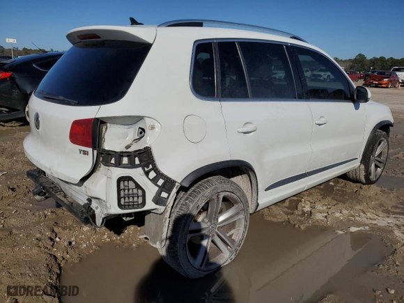 2016 Volkswagen Tiguan SEL with VIN WVGAV7AX7GW010490, listed as a Copart auction lot 43191995 with NaN miles and Salvage Title. Bid and sale history available at carsss.com. Image 3.