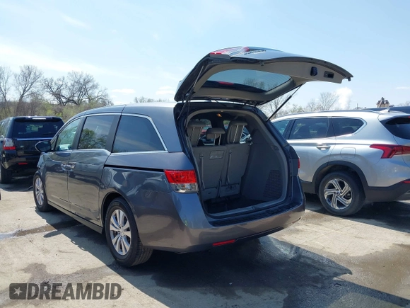 2014 Honda Odyssey EX-L with VIN 5FNRL5H64EB100941, listed as a IAAI auction lot 41918845 with 175,748 mi miles and . Bid and sale history available at DreamBid. Image 3.