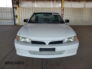 2001 Mitsubishi Mirage ES z VIN JA3AY26CX1U013535, wystawiony jako Copart lot #57664885 z przebiegiem 159 095 mil mil oraz Szkoda całkowita • Salvage title. Historia ofert i sprzedaży dostępna na DreamBid. Obrazek 5.