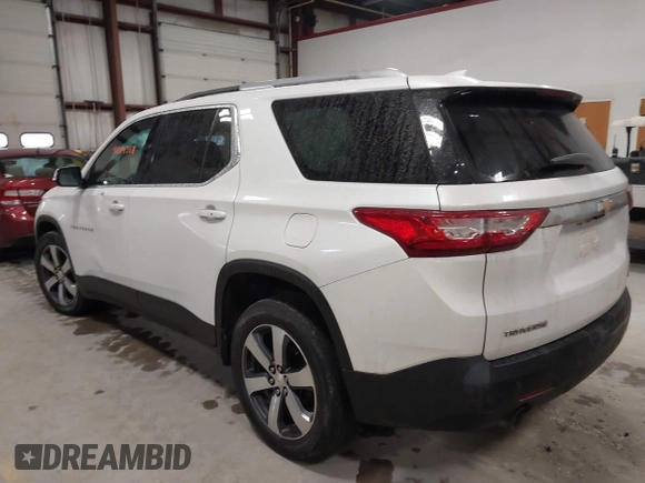 2018 Chevrolet Traverse LT Leather with VIN 1GNEVHKW3JJ230464, listed as a IAAI auction lot 41184358 with 132,189 mi miles. Bid and sale history available at carsss.com. Image 3.