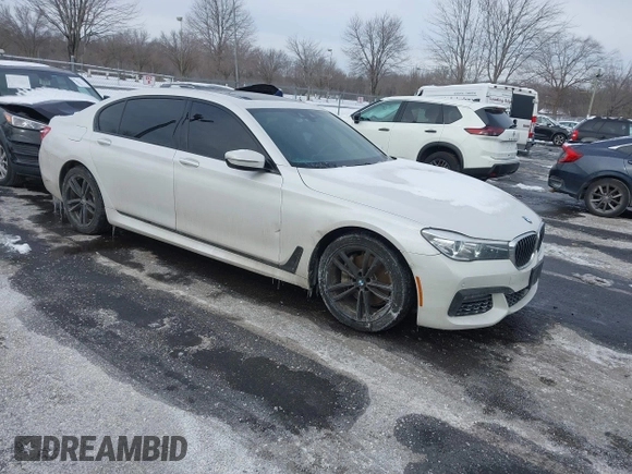 2018 BMW 7 Series 740i xDrive with VIN WBA7E4C59JGV23876, listed as a IAAI auction lot 41381398 with 106,675 mi miles. Bid and sale history available at carsss.com. Image 1.