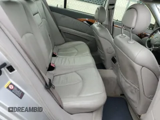 2003 Mercedes-Benz E-Class 5.0L with VIN WDBUF70J03A112909, listed as a Copart auction lot 49924865 with 158,244 mi miles and Salvage Title. Bid and sale history available at carsss.com. Image 10.
