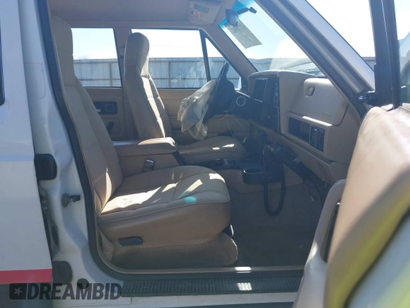 1995 Jeep Cherokee Sport with VIN 1J4FJ68S1SL576255, listed as a IAAI auction lot 42178902 with 214,041 mi miles and . Bid and sale history available at DreamBid. Image 5.