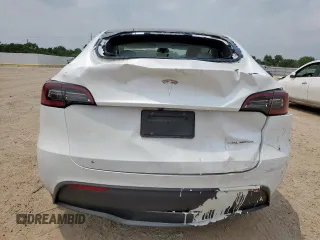 2024 Tesla Model Y Long Range with VIN 7SAYGDEE6RA290124, listed as a Copart auction lot 57662385 with 14,751 mi miles and Salvage title. Bid and sale history available at DreamBid. Image 6.