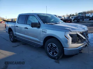 2023 Ford F-150 Lightning Pro z VIN 1FTVW1EL3PWG61686, wystawiony jako Copart lot #87870815 z przebiegiem Nie podano mil oraz Szkoda całkowita • Salvage title. Historia ofert i sprzedaży dostępna na DreamBid. Obrazek 4.