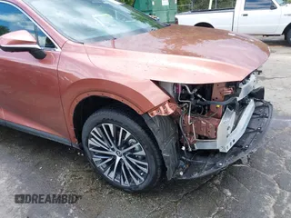 2024 Lexus RX 350h with VIN 2T2BBMCA1RC054680, listed as a IAAI auction lot 42157910 with 5,392 mi miles and . Bid and sale history available at DreamBid. Image 18.