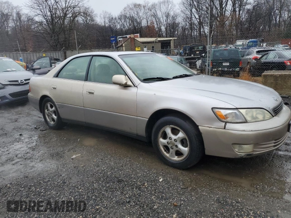 1999 Lexus ES 300 Luxury Sport Sdn with VIN JT8BF28GXX5067205, listed as a Copart auction lot 83018394 with 170,573 mi miles and Salvage Title. Bid and sale history available at carsss.com. Image 4.