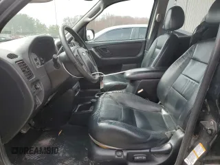 2004 Ford Escape Limited with VIN 1FMCU94154KB50085, listed as a Copart auction lot 50404455 with 180,249 mi miles and Salvage Title. Bid and sale history available at carsss.com. Image 7.