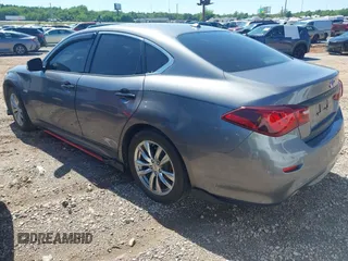 2015 Infiniti M Hybrid with VIN JN1EY1AP2FM510029, listed as a IAAI auction lot 41795913 with 152,475 mi miles. Bid and sale history available at carsss.com. Image 3.