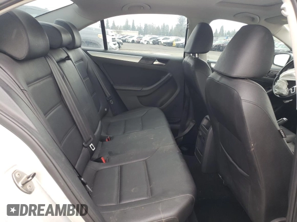 2012 Volkswagen Jetta Sedan TDI with VIN 3VW3L7AJ0CM089765, listed as a Copart auction lot 82358034 with 144,648 mi miles and Salvage Title. Bid and sale history available at carsss.com. Image 10.
