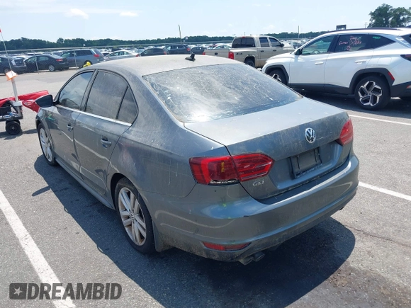 2014 Volkswagen Jetta GLI Autobahn with VIN 3VW5T7AJ6EM201416, listed as a IAAI auction lot 42684207 with 164,905 mi miles and . Bid and sale history available at DreamBid. Image 3.