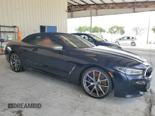 2019 BMW 8 Series M850i xDrive with VIN WBAFY4C59KBX38790, listed as a Copart auction lot 69656654 with 30,863 mi miles and Salvage Title. Bid and sale history available at carsss.com. Image 4.