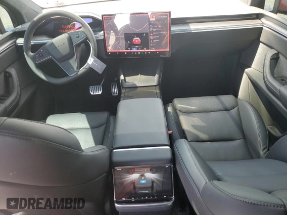 2023 Tesla Model X Plaid with VIN 7SAXCBE66PF427020, listed as a Copart auction lot 53890405 with 30,575 mi miles and Salvage Title. Bid and sale history available at DreamBid. Image 8.