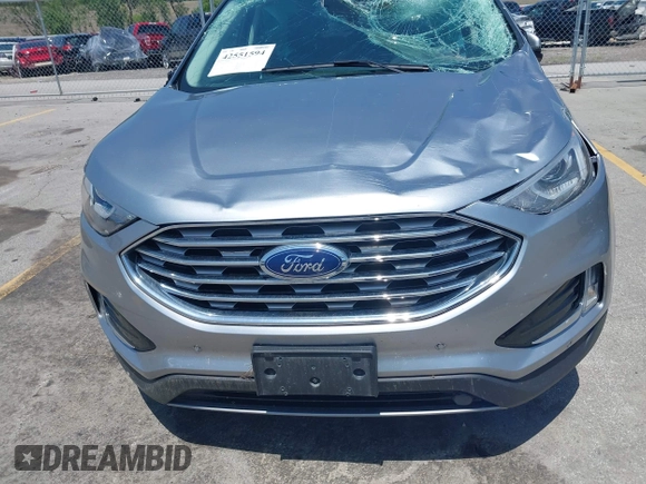 2022 Ford Edge Titanium with VIN 2FMPK4K96NBA41746, listed as a IAAI auction lot 42551594 with 86,730 mi miles and . Bid and sale history available at DreamBid. Image 12.