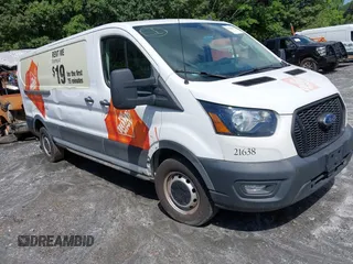 2021 Ford Transit Cargo z VIN 1FTBR1Y83MKA76305, wystawiony jako IAAI lot #42240276 z przebiegiem 75 256 mil mil oraz . Historia ofert i sprzedaży dostępna na DreamBid. Obrazek 1.