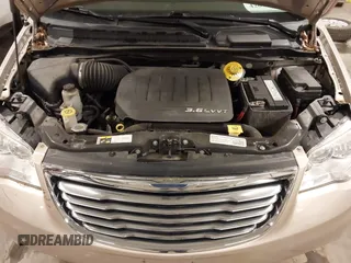 2014 Chrysler Town & Country Touring with VIN 2C4RC1BG2ER422914, listed as a IAAI auction lot 42017742 with 49,856 mi miles and . Bid and sale history available at DreamBid. Image 10.