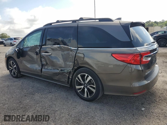 2019 Honda Odyssey Elite z VIN 5FNRL6H90KB027207, wystawiony jako Copart lot #60265905 z przebiegiem 69 313 mil mil oraz Szkoda całkowita • Salvage title. Historia ofert i sprzedaży dostępna na DreamBid. Obrazek 2.