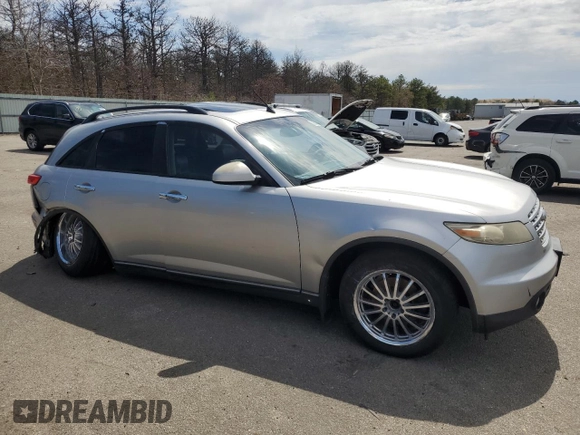 2003 Infiniti FX Options z VIN JNRAS08W03X208799, wystawiony jako Copart lot #52866345 z przebiegiem 229 666 mil mil oraz Szkody całkowita. Historia ofert i sprzedaży dostępna na DreamBid. Obrazek 4.