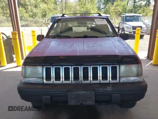 1995 Jeep Grand Cherokee Laredo with VIN 1J4GZ58Y6SC508349, listed as a IAAI auction lot 42630804 with 223,519 mi miles and . Bid and sale history available at DreamBid. Image 6.