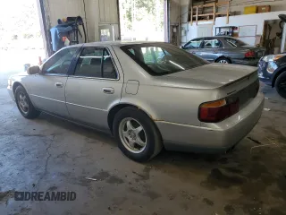 2000 Cadillac Seville Luxury SLS z VIN 1G6KS54Y5YU205420, wystawiony jako Copart lot #73254744 z przebiegiem 220 753 mil mil oraz Nie do naprawy • Non repairable. Historia ofert i sprzedaży dostępna na DreamBid. Obrazek 2.