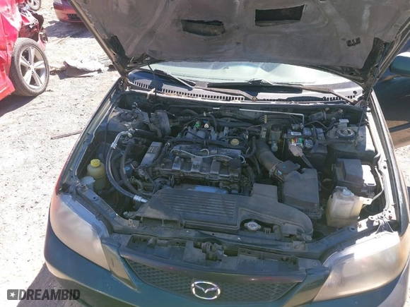 2002 Mazda Protege DX with VIN JM1BJ225121601070, listed as a IAAI auction lot 41650083 with 169,662 mi miles. Bid and sale history available at carsss.com. Image 10.