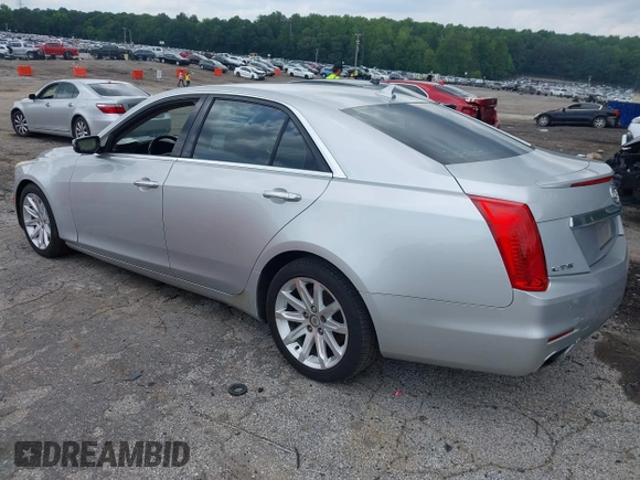 2014 Cadillac CTS Luxury RWD z VIN 1G6AR5S38E0173628, wystawiony jako IAAI lot #42343647 z przebiegiem 166 035 mil mil oraz . Historia ofert i sprzedaży dostępna na DreamBid. Obrazek 3.