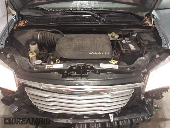 2013 Chrysler Town & Country Touring with VIN 2C4RC1BG8DR689862, listed as a IAAI auction lot 41082531 with 181,447 mi miles. Bid and sale history available at carsss.com. Image 10.