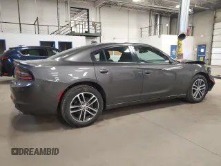2019 Dodge Charger SXT with VIN 2C3CDXJG4KH520470, listed as a Copart auction lot 51947755 with 90,876 mi miles and Salvage Title. Bid and sale history available at DreamBid. Image 3.
