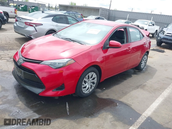 2019 Toyota Corolla L with VIN 5YFBURHE4KP883871, listed as a IAAI auction lot 41979494 with 179,078 mi miles. Bid and sale history available at carsss.com. Image 19.