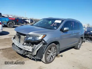 2017 Honda Pilot Touring with VIN 5FNYF5H93HB008088, listed as a IAAI auction lot 41699129 with 110,830 mi miles. Bid and sale history available at carsss.com. Image 2.