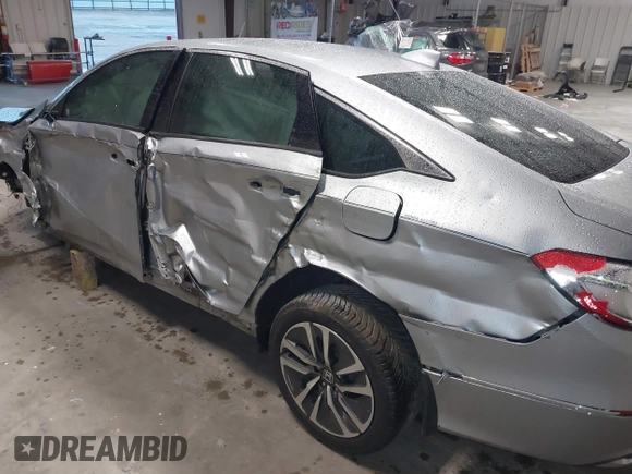 2018 Honda Accord Touring z VIN 1HGCV3F94JA001591, wystawiony jako IAAI lot #42161624 z przebiegiem 100 591 mil mil oraz . Historia ofert i sprzedaży dostępna na DreamBid. Obrazek 22.