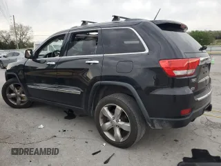 2012 Jeep Grand Cherokee Overland with VIN 1C4RJECT7CC311578, listed as a Copart auction lot 51905715 with 172,980 mi miles and Salvage Title. Bid and sale history available at carsss.com. Image 2.