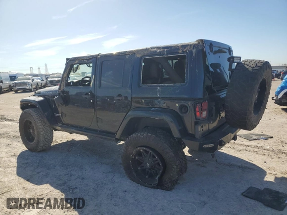 2015 Jeep Wrangler Unlimited Rubicon Hard Rock with VIN 1C4HJWFG1FL710264, listed as a Copart auction lot 47563975 with 96,737 mi miles and Salvage title. Bid and sale history available at DreamBid. Image 2.