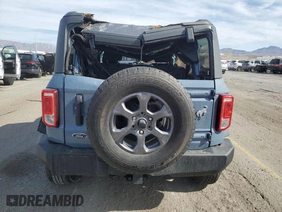 2023 Ford Bronco z VIN 1FMDE5AH6PLB63177, wystawiony jako Copart lot #52208625 z przebiegiem 10 865 mil mil oraz Szkoda całkowita • Salvage title. Historia ofert i sprzedaży dostępna na DreamBid. Obrazek 6.