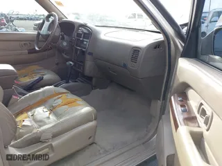 2000 Nissan Pathfinder XE with VIN JN8AR07S0YW417987, listed as a IAAI auction lot 41883473 with 223,721 mi miles. Bid and sale history available at carsss.com. Image 5.