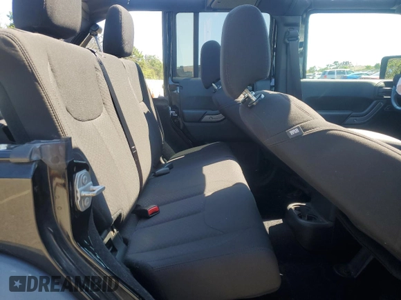 2017 Jeep Wrangler Unlimited Sport with VIN 1C4HJWDG8HL744823, listed as a Copart auction lot 65827465 with 51,859 mi miles and Salvage title. Bid and sale history available at DreamBid. Image 11.