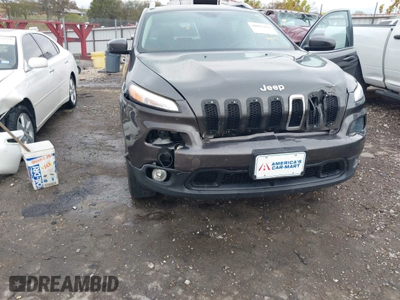 2014 Jeep Cherokee Altitude with VIN 1C4PJMCB7EW232678, listed as a IAAI auction lot 40812147 with 105,828 mi miles. Bid and sale history available at carsss.com. Image 6.