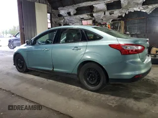 2012 Ford Focus SE with VIN 1FAHP3F27CL149328, listed as a Copart auction lot 56000325 with 147,097 mi miles and Salvage Title. Bid and sale history available at DreamBid. Image 2.