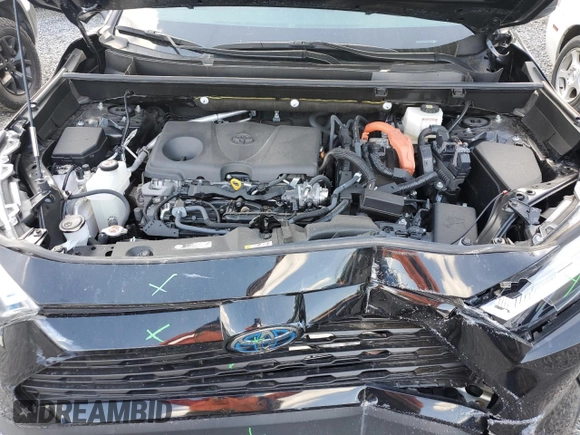 2023 Toyota RAV4 Hybrid LE with VIN JTMLWRFV7PD204946, listed as a Copart auction lot 51330055 with 10,560 mi miles and Salvage Title. Bid and sale history available at carsss.com. Image 12.