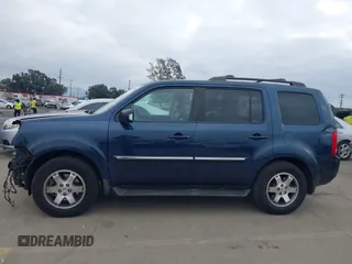 2009 Honda Pilot Touring with VIN 5FNYF48929B040199, listed as a IAAI auction lot 41466006 with 167,959 mi miles and . Bid and sale history available at carsss.com. Image 15.
