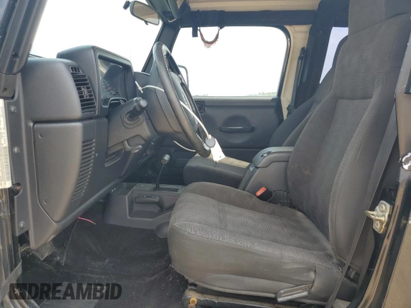 2005 Jeep Wrangler X z VIN 1J4FA39S75P321328, wystawiony jako Copart lot #59711505 z przebiegiem 126 768 mil mil oraz Szkoda całkowita • Salvage title. Historia ofert i sprzedaży dostępna na DreamBid. Obrazek 7.