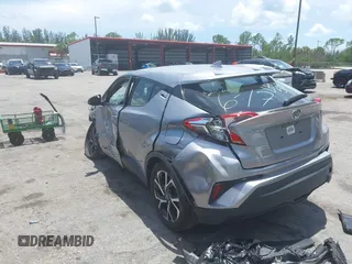 2018 Toyota C-HR XLE with VIN JTNKHMBX7J1009692, listed as a IAAI auction lot 42390685 with 77,866 mi miles and . Bid and sale history available at DreamBid. Image 3.